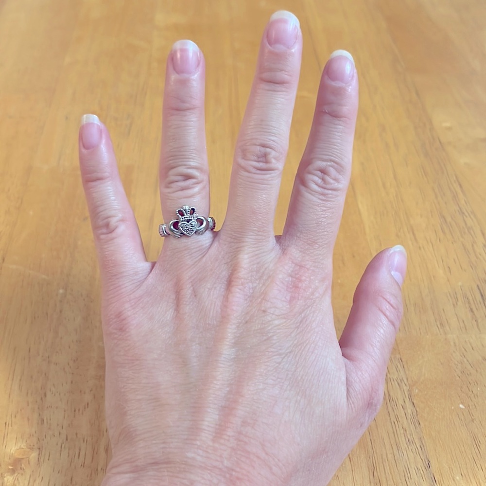 White gold claddagh ring with real diamonds. Size 4.